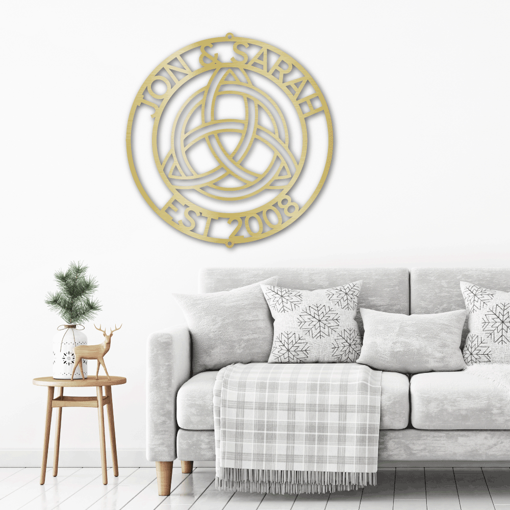 metal wall art sign of a Celtic Knot that you can pesonalize with your own names, date or text. Hang this during as home decor on your wall. This picture shows the design in the color gold