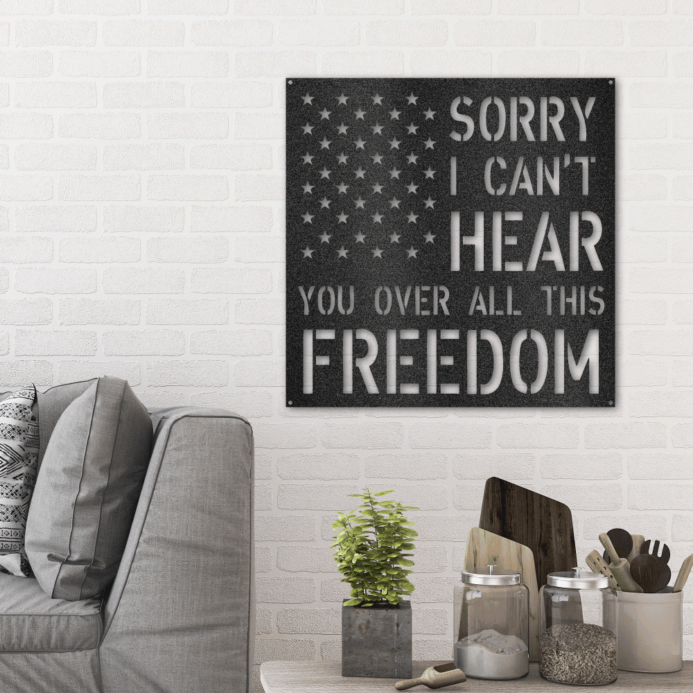 With the American Stars and the 'Sorry I can't hear you over all this freedom' text looking like stripes as its background, this metal wall art is sure to bring your room together. Hang it above a bed or on the wall near a fireplace or next to your favorite patriotic item.