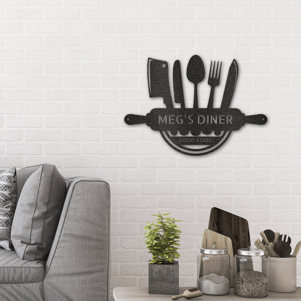 Metal Wall Art Sign with a cooking theme that you can personalize with your own text or names. Hanging on the wall in the color black