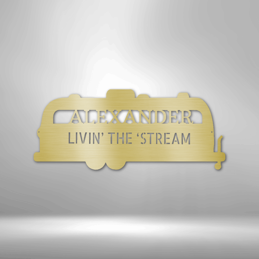 Silhouette of a airstream trailer as a metal wall art piece. Personalize this steel sign with any name or fun text. This metal decor is available in the color gold