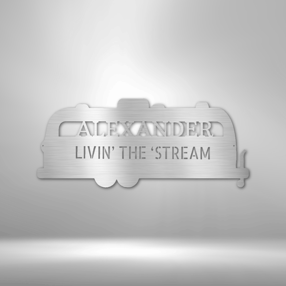 Silhouette of a airstream trailer as a metal wall art piece. Personalize this steel sign with any name or fun text. This metal decor is available in the color silver