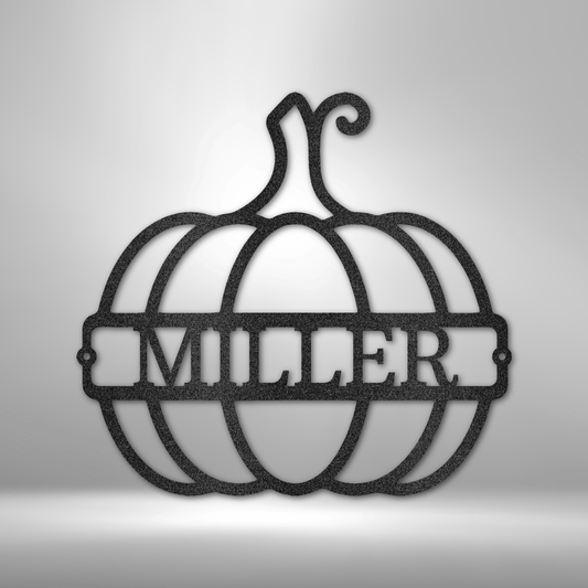 Outline of a pumpkin with a name inside of it as a metal wall art piece in the color black