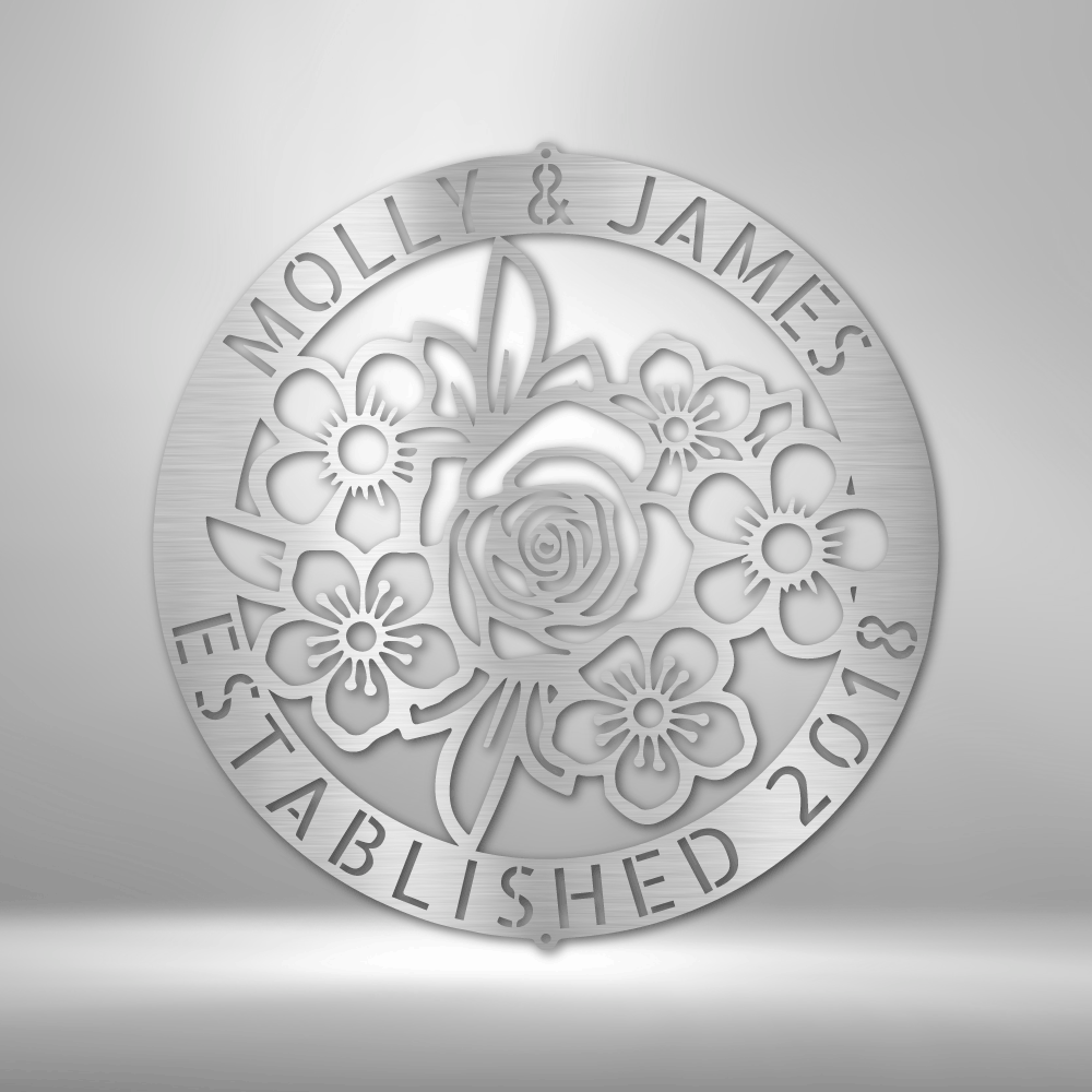 Metal Wall Art Sign of Flowers inside a personalizable ring hanging on the wall in the color silver