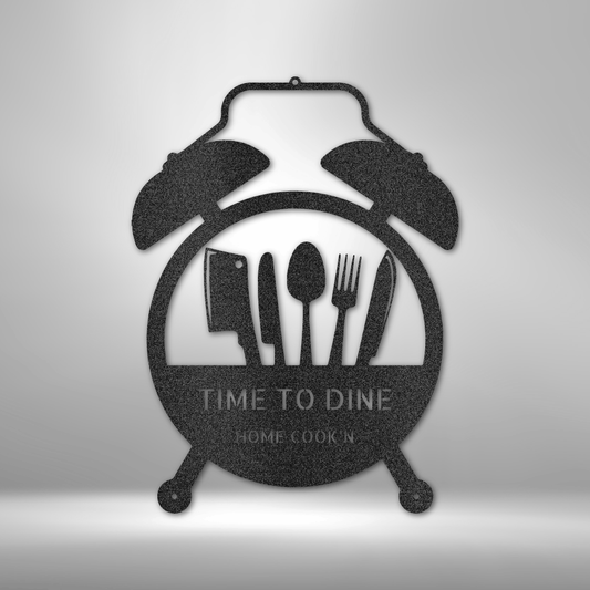 Retro Alarm Clock Metal Wall Art Sign With A Cooking Theme hanging on the wall in the color black