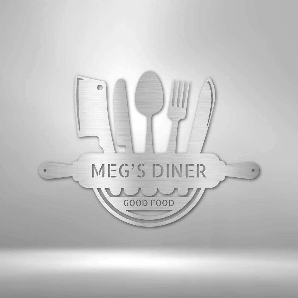 Metal Wall Art Sign with a cooking theme that you can personalize with your own text or names. Hanging on the wall in the color silver