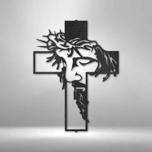 steel sign of Jesus Chirst with his crown of thorns inside a cross in the color black