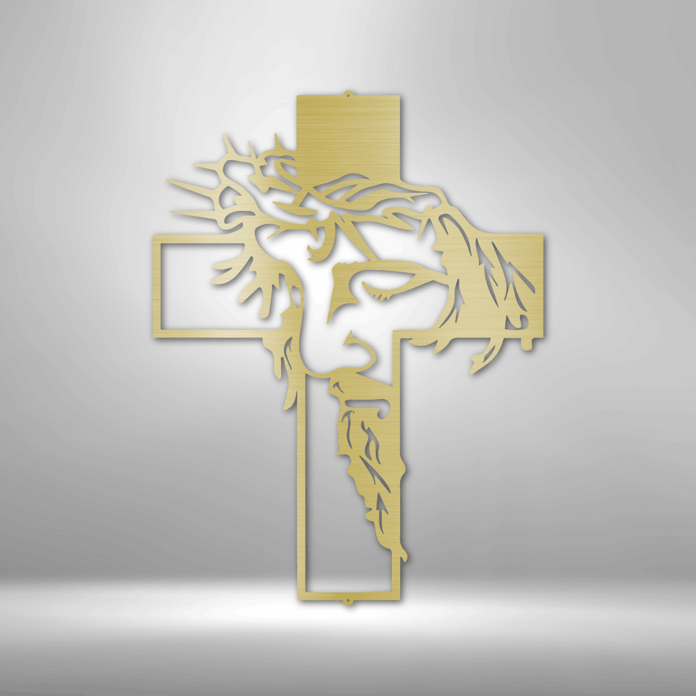 steel sign of Jesus Chirst with his crown of thorns inside a cross in the color gold