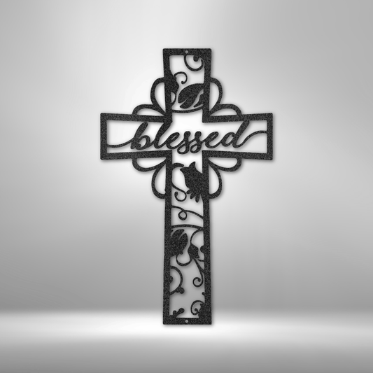 Metal wall art sign of a christian cross with the word blessed inside it. The piece is decorated with metal leafs. The picture show the design in the color black