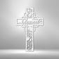 Metal wall art sign of a christian cross with the word blessed inside it. The piece is decorated with metal leafs. The picture show the design in the color white