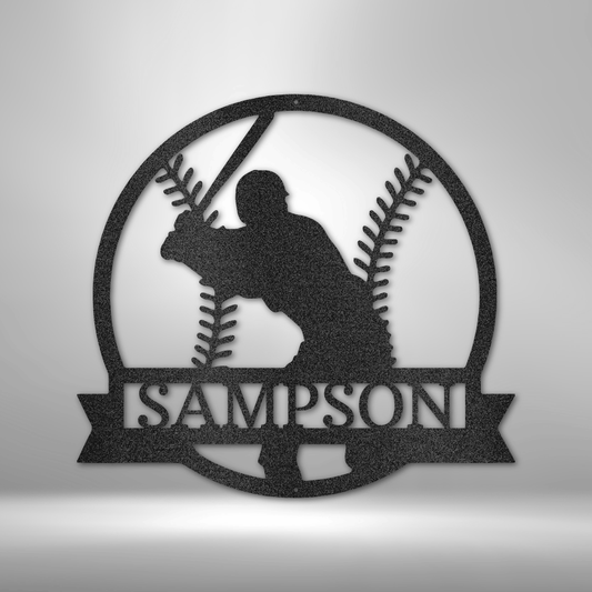 metal wall art sign of a baseball player inside a baseball with a custom name or text. Hang this on your wall as home decor. This picture shows the design in the color black