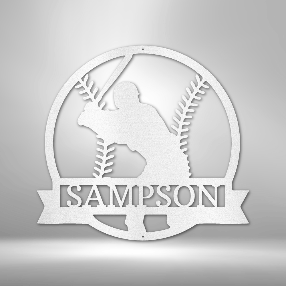 metal wall art sign of a baseball player inside a baseball with a custom name or text. Hang this on your wall as home decor. This picture shows the design in the color white