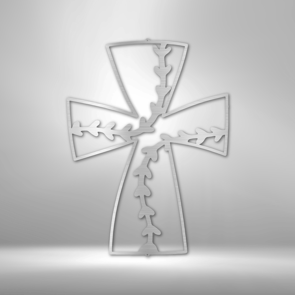 Metal wall art sign of a christian cross with a pattern of baseball stitches. This is a wall art design that you can use as a sports decor. This picture shows the steel design in the color silver