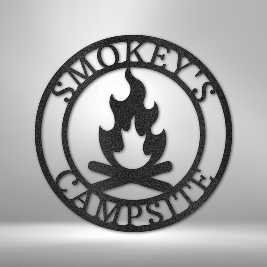Metal Wall Art Sign of a campfire inside a ring. In the ring you can add personalized names or text. The picture shows the steel design in the color black
