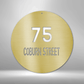Circle with house number and street name to customize in the color gold
