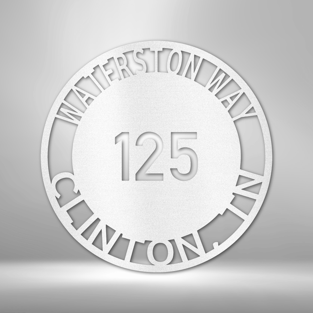 Metal wall art sign for your address. It is a circle with your street name or familly name that you can hang next to your front door, on your porch or a fence. This picture shows the design in the color white