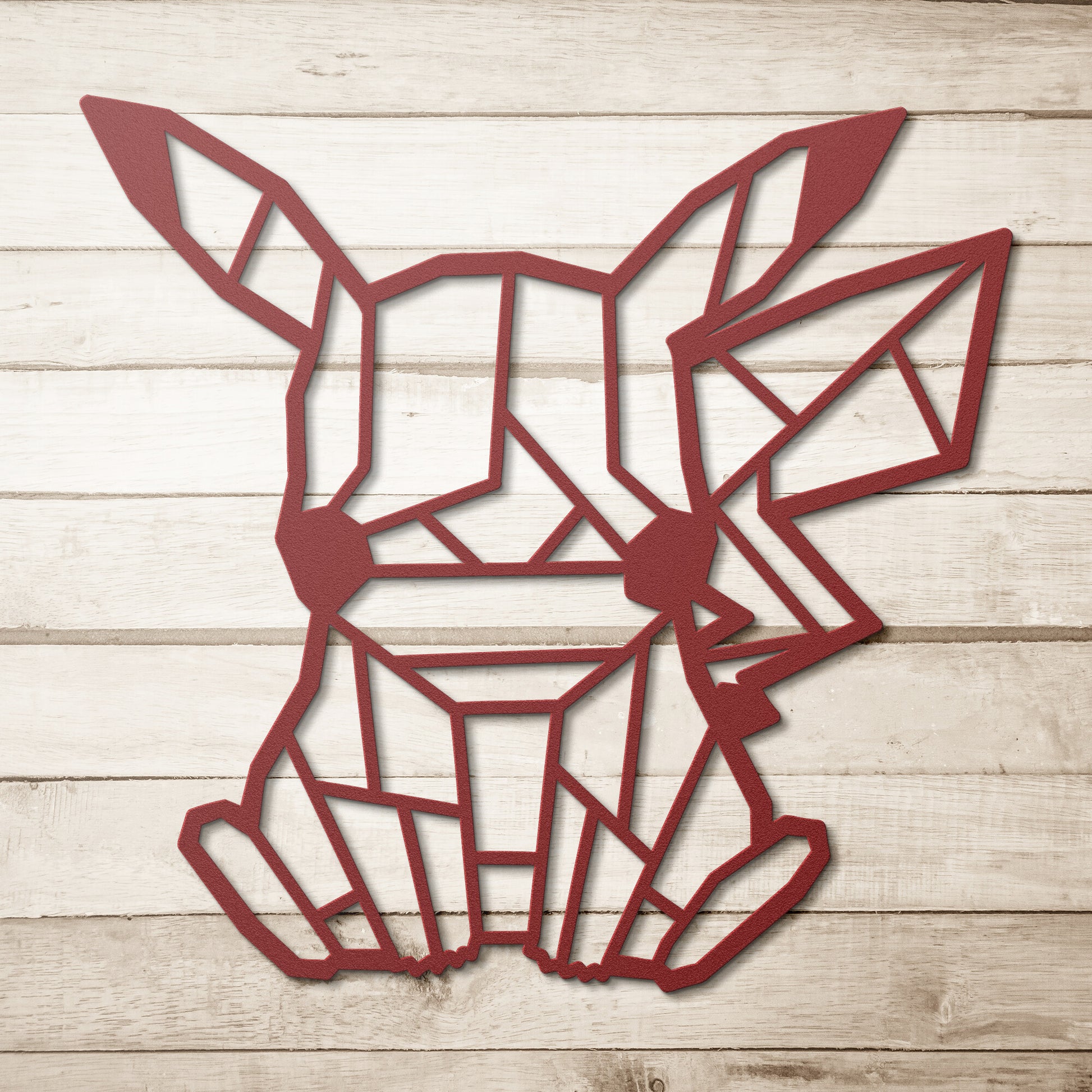 Metal Wall Art Sign of pikachu in geometric style hanging on the wall. This picture shows the design of this pokemon in the color red
