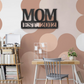 Metal Steel Sign with big letters MOM and underneath it is possible to add a custom text or name. The steel sign is hanging on the wall in the color black