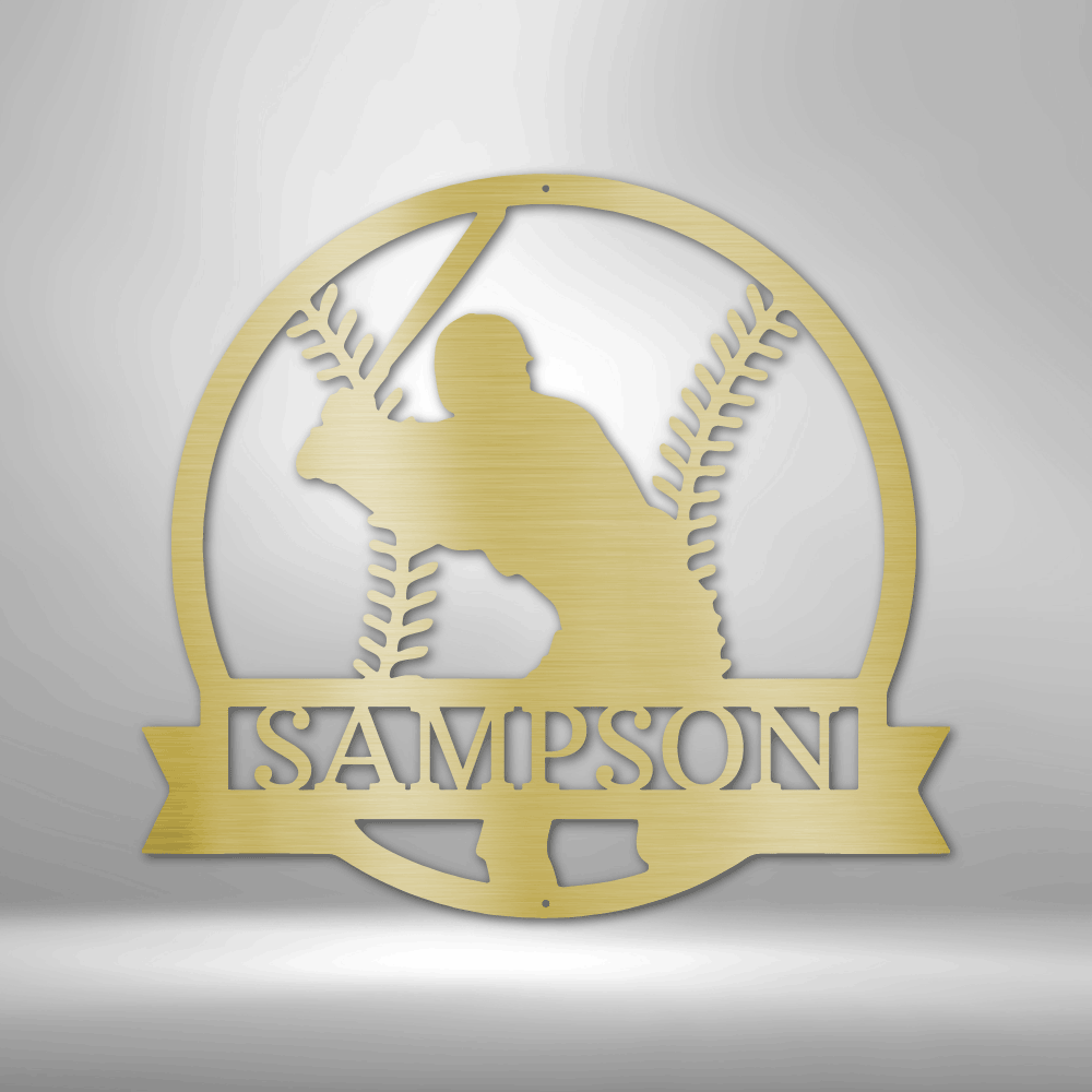 metal wall art sign of a baseball player inside a baseball with a custom name or text. Hang this on your wall as home decor. This picture shows the design in the color gold