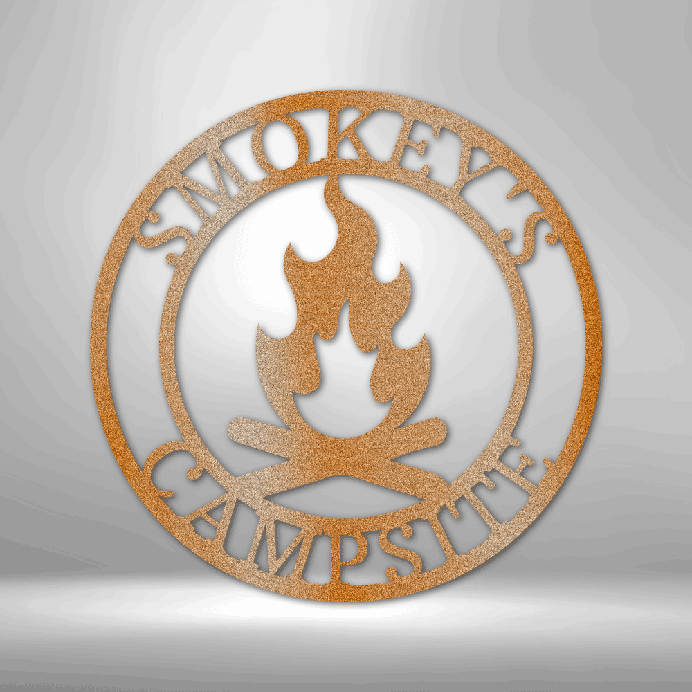 Metal Wall Art Sign of a campfire inside a ring. In the ring you can add personalized names or text. The picture shows the steel design in the color copper