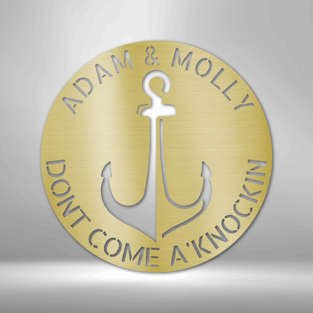 Round metal wall sign with a anchor in the middle. Around there is place to customize it with your names or any text. In the color gold